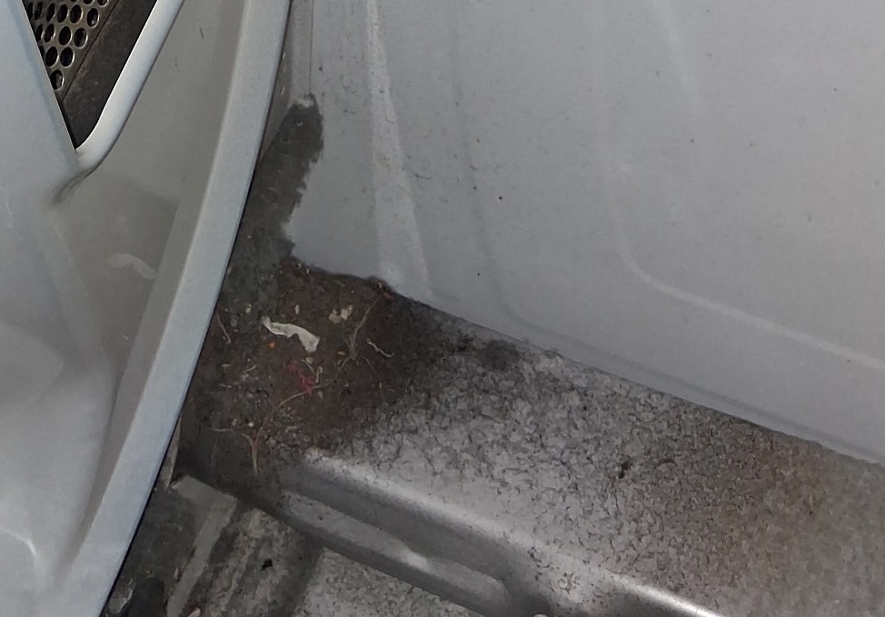 Lint buildup on a dryer heating element documented during a Knapp's service call in the Portland area.