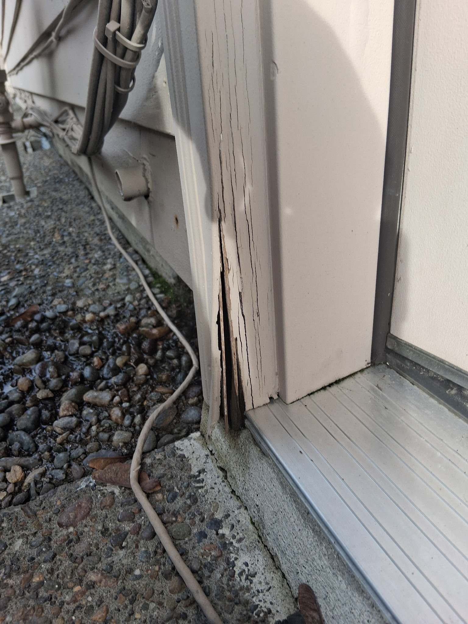 Rotted wood trim around an appliance opening documented during a Knapp's service call in the Portland area.